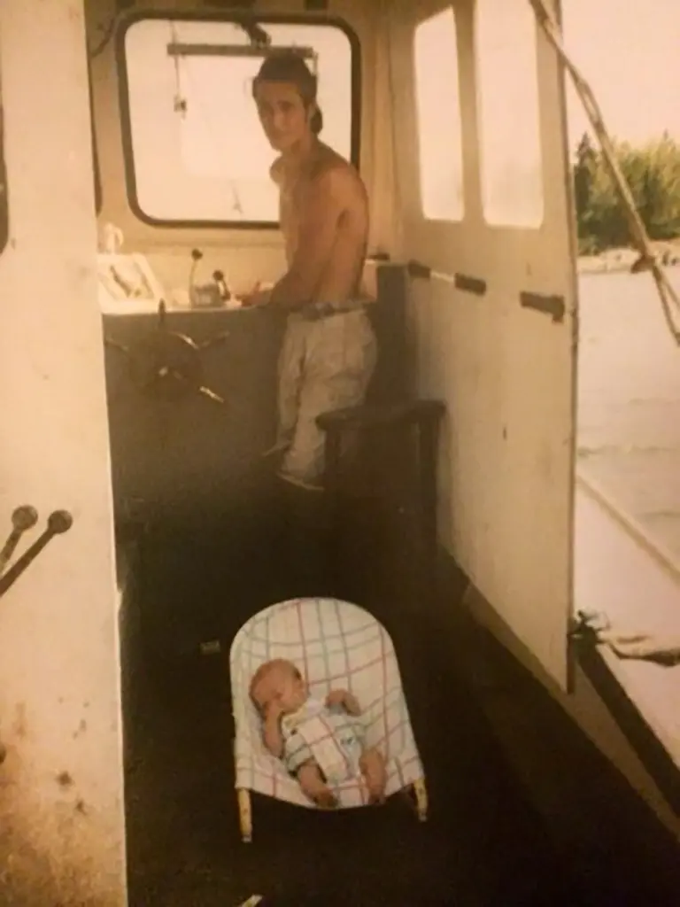 Jordon Hudson as a baby with her father Heath Hudson as he worked on a boat in Maine.
