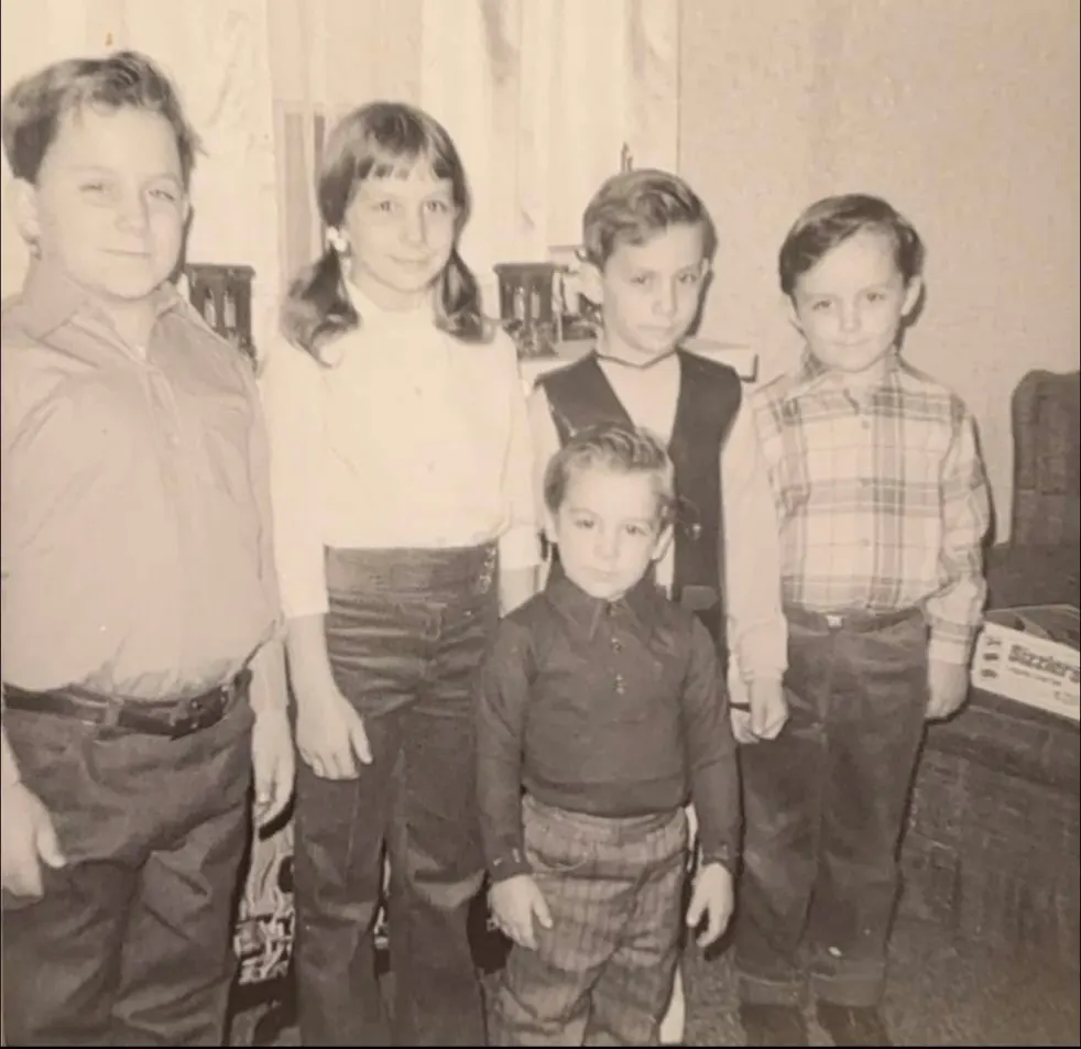 Young Chris St. Pierre and his siblings