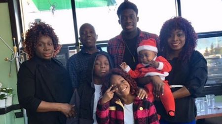 Alphonso Davies with his Family