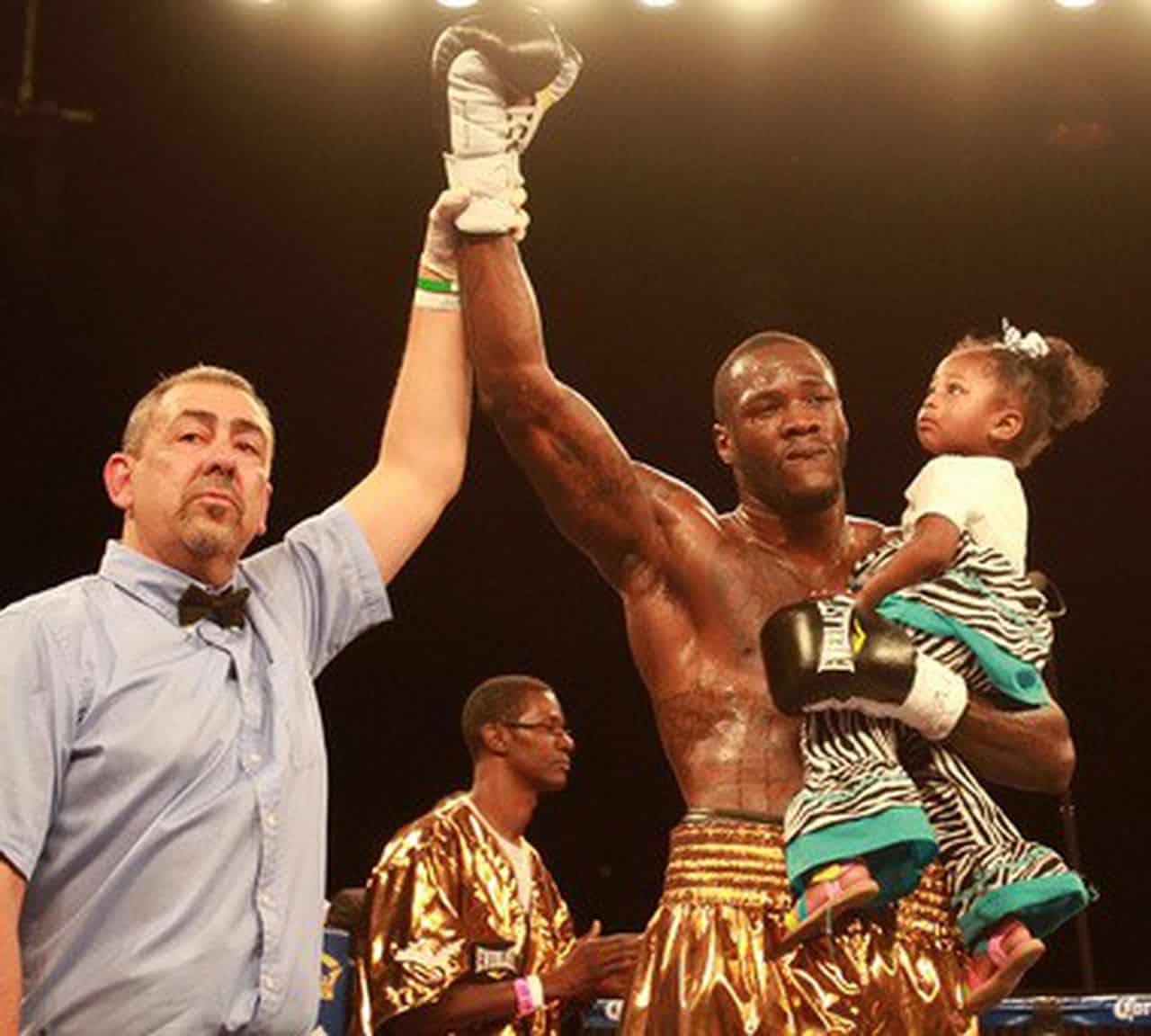 Deontay Wilder sharing his victory with his child
