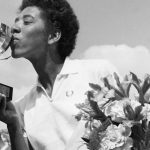 Althea Neale Gibson with her precious award