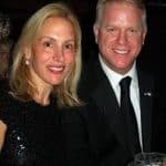 Boomer Esaison with his wife Cheryl