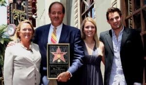 Chris-Berman-with-his-wife-and-children
