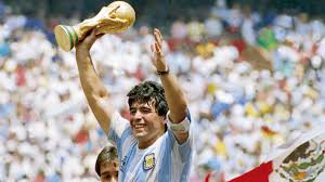 Diego Maradona with his precious award
