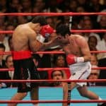 Oscar De La Hoya fighting with Felix Strum