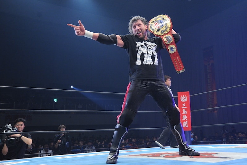 Kenny Omega celebrating his victory