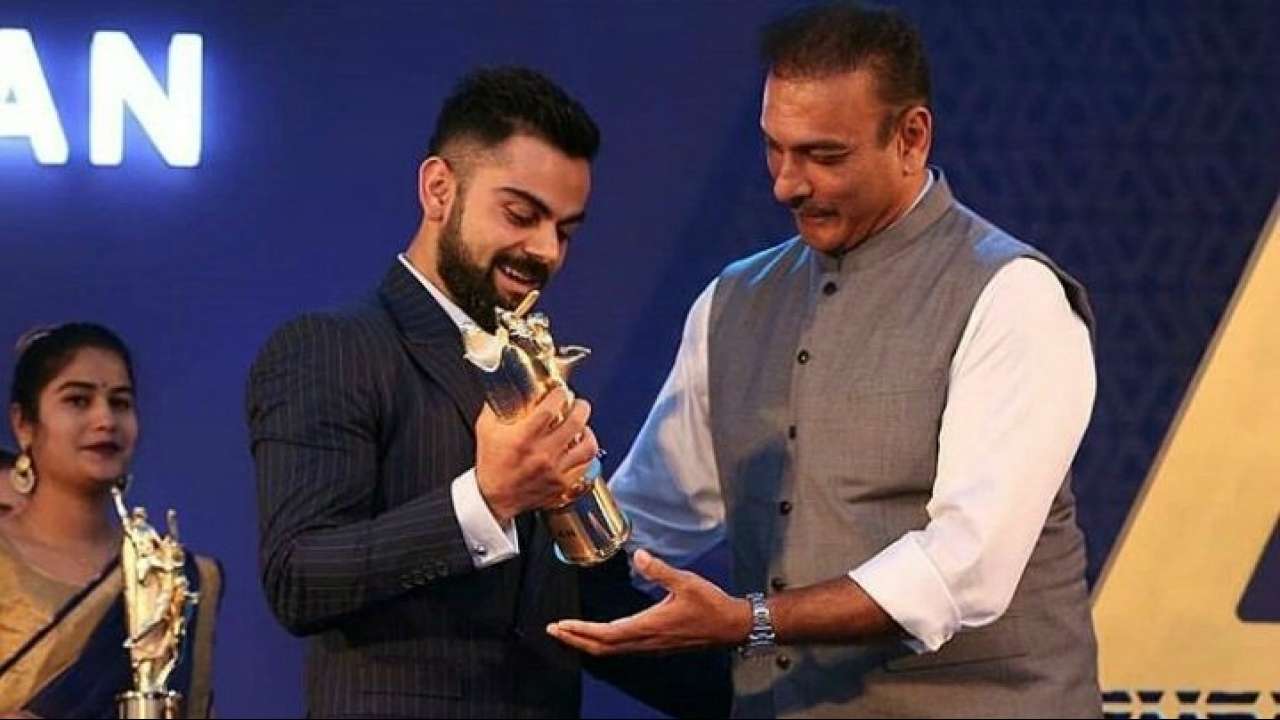 Virat Kohli with his precious award