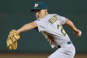 Pat Venditte pitching for Oakland Athletics