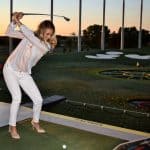Amanda playing golf