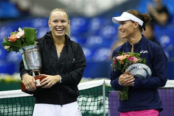 Caroline-Wozniacki-smiles-as-she-holds-her-Kremlin-Cup-title