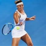 Domi Playing Tennis