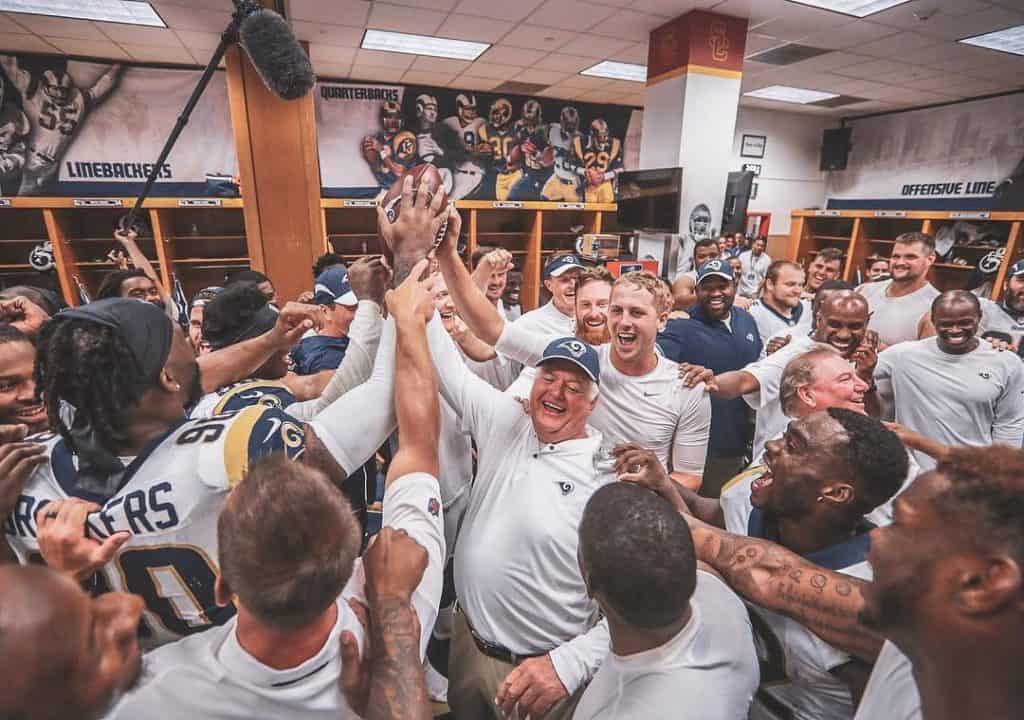 Jared Goff and the Rams team after a match victory.