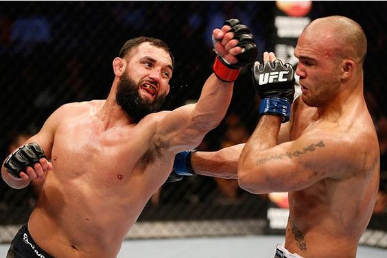 Johny Hendricks fighting against Robbie Lawler.