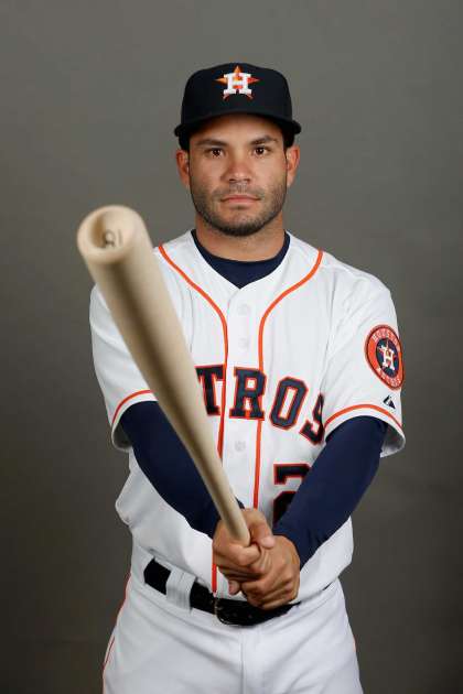 Jose posing with his bat