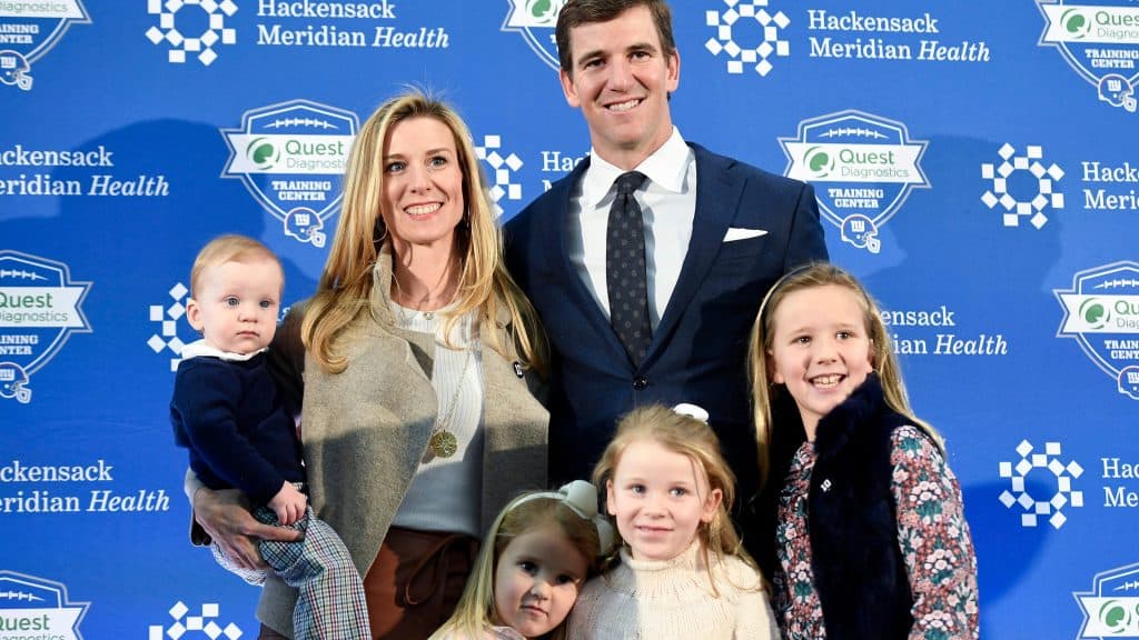 Manning with Wife(Abby) and his children