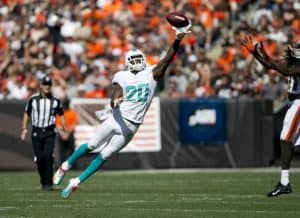 Reshad Jones attempting an interception.