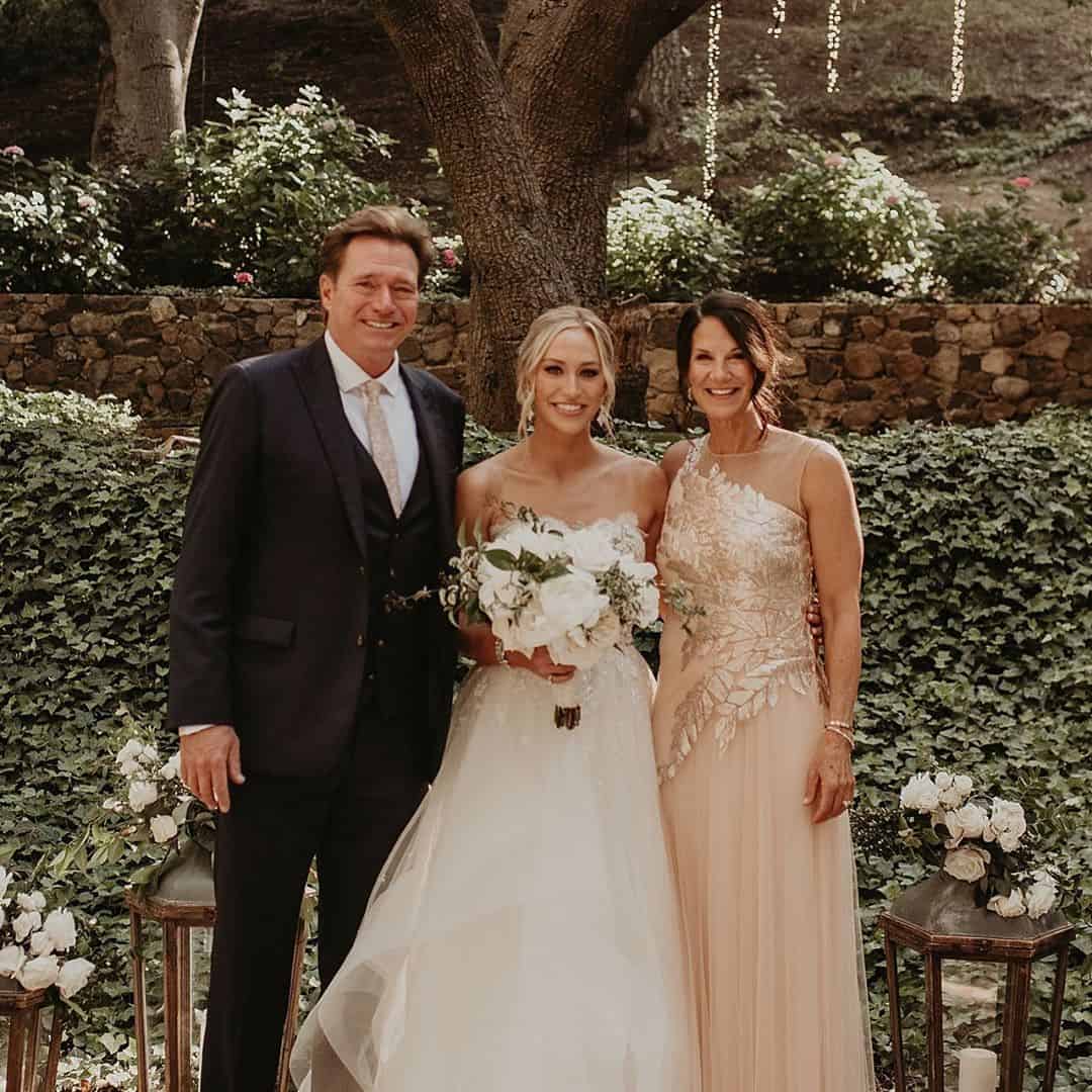 Emily with her parents.