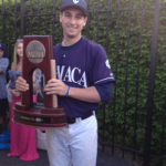 Holding the NCAA Championship Trophy
