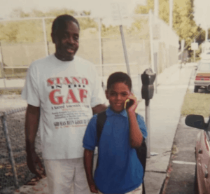 Young Denzel Perryman with his father