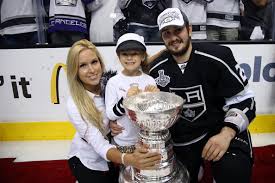Jake Muzzin with his beautiful wife and daughter