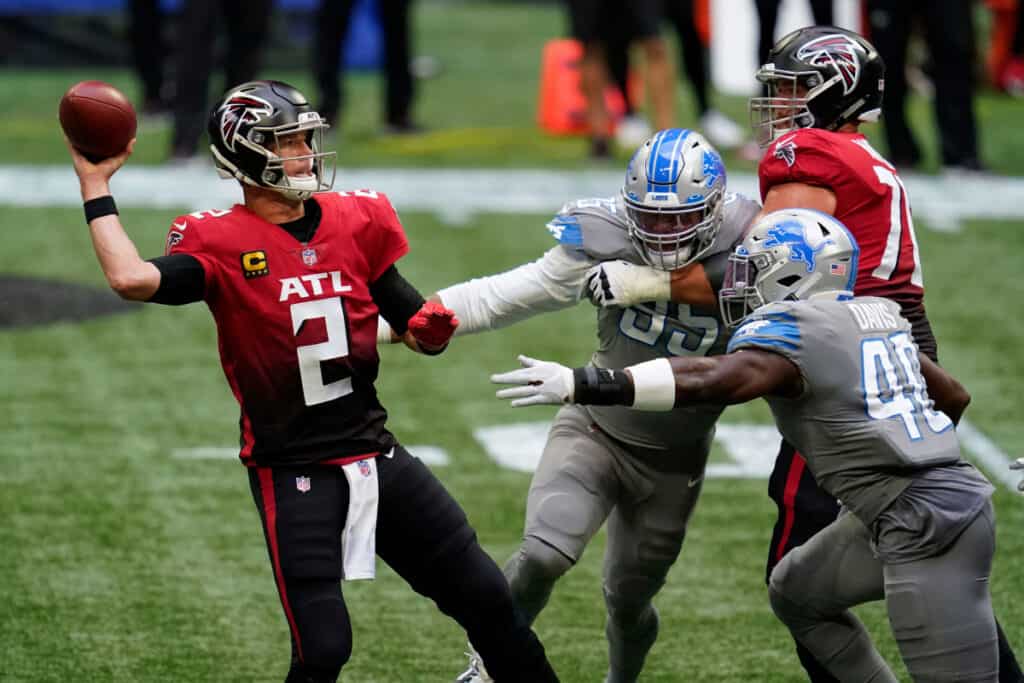 Atlanta Falcons quarterback Matt Ryan releases the ball under pressure from Detroit Lions