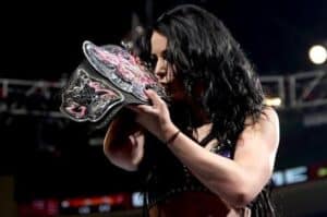 Paige holding Diva's Championship title