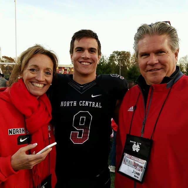 Rutter with his parents 