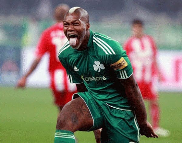 Djibril Cisse celebrates after scoring goal