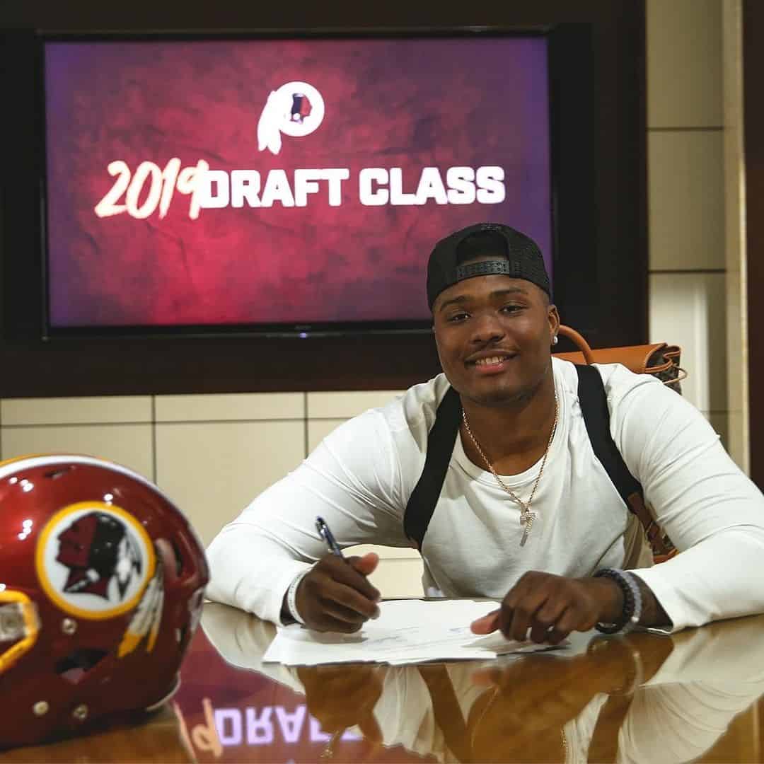 Haskins signing rookie contract with Washington