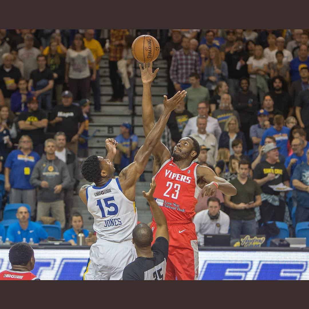 Onuaku (red) during tip-off