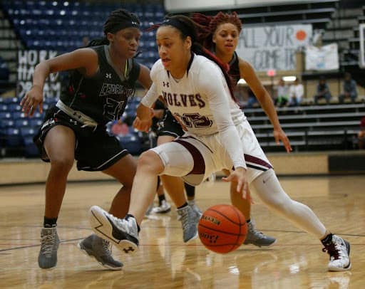 Chennedy Carter playing for Timberview High School