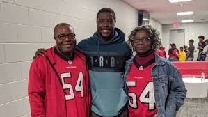 Oluokun with his parents
