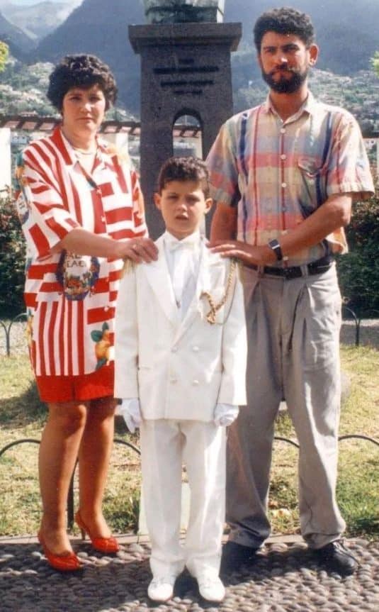 Cristiano Ronaldo with his father and mother