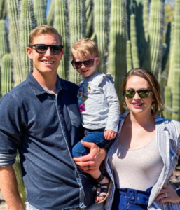 Casey Sadler with his wife and son