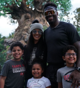 Shaq Barrett with his wife and kids