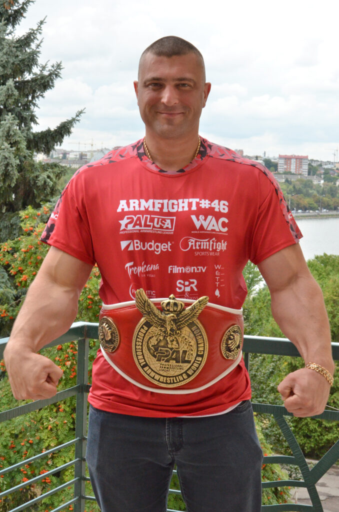 Andriy Pushkar with his Championship belt