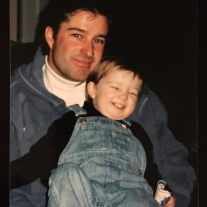 A young Jared McCann with his father