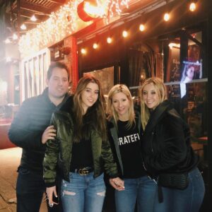 Kenny Albert with his family