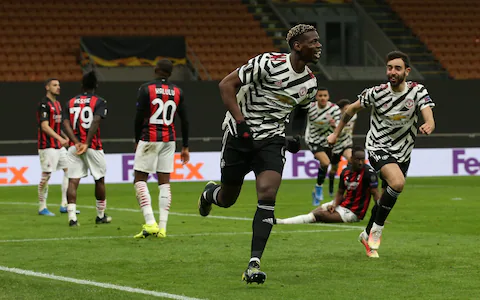 Paul Pogba celebrates after scoring the winner against AC Milan