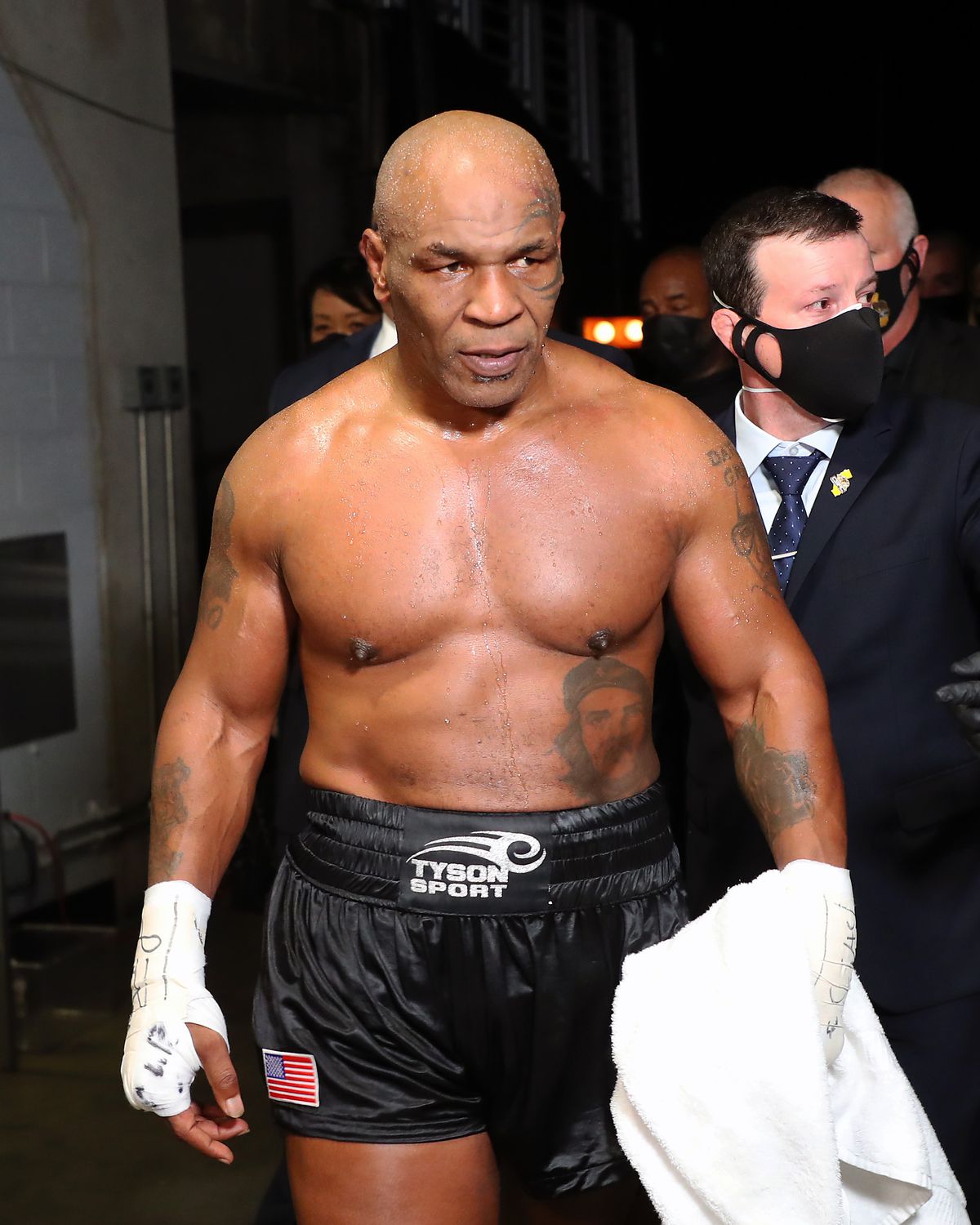 Mike Tyson (black trunks) Exits The Ring After His Split Draw Against Roy Jones, Jr. On November 28, 2022 
