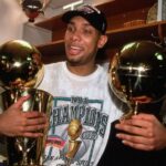 Tim Duncan after winning 1999 NBA championhip and NBA Finals MVP trophy