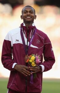 Mutaz Barshim with a bronze medal at the 2012 Olympics