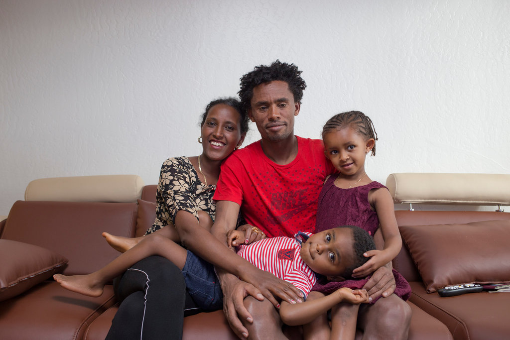 Feyisas Lilea With His Wife And Children