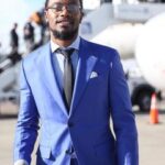 De’Vante-Bausby-in-suit-at-airpot