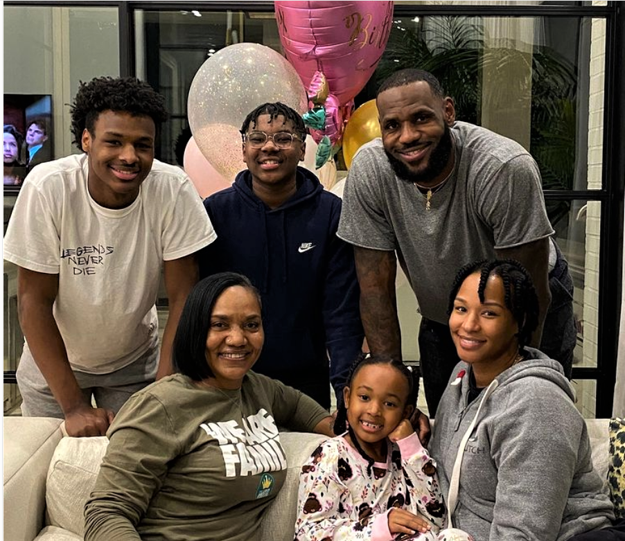 James Crew In A Frame; LeBron, Bronny, Bryce, Savannah, Zhuri, And Gloria From Left To Right