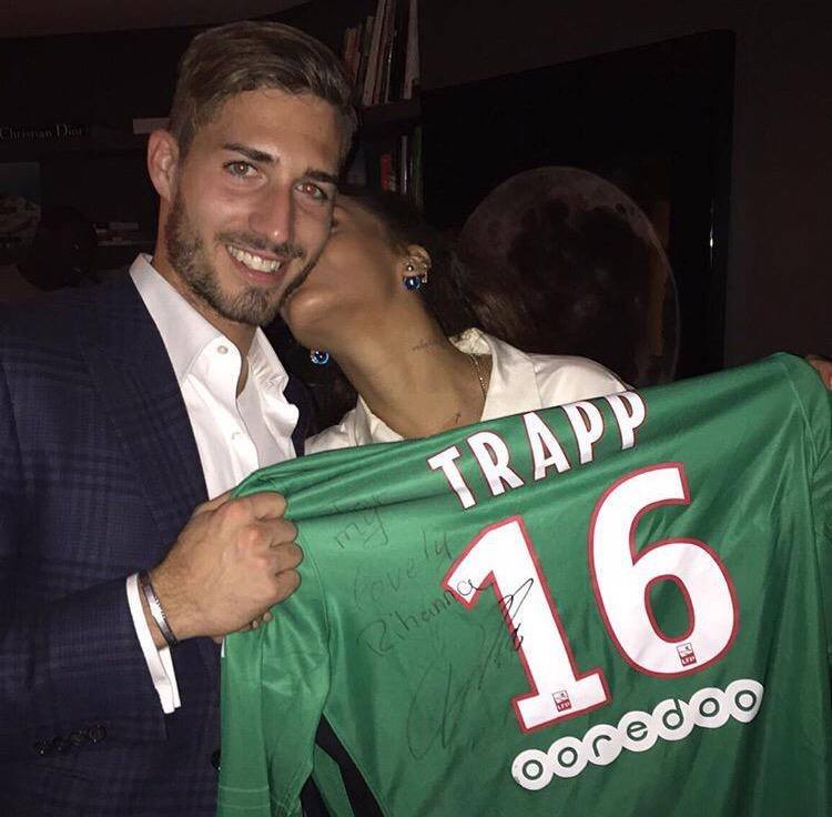 Kevin Trapp and Rihanna celebrating PSG's victory after the match.