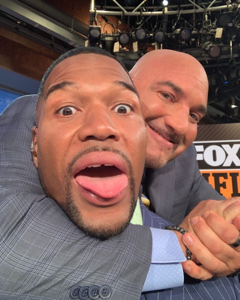 Michael Strahan being playful