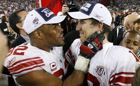 Michael Strahan celebrating a victory