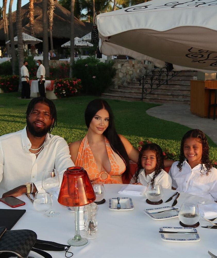 Paul George and Daniela with their two daughters during a vacation