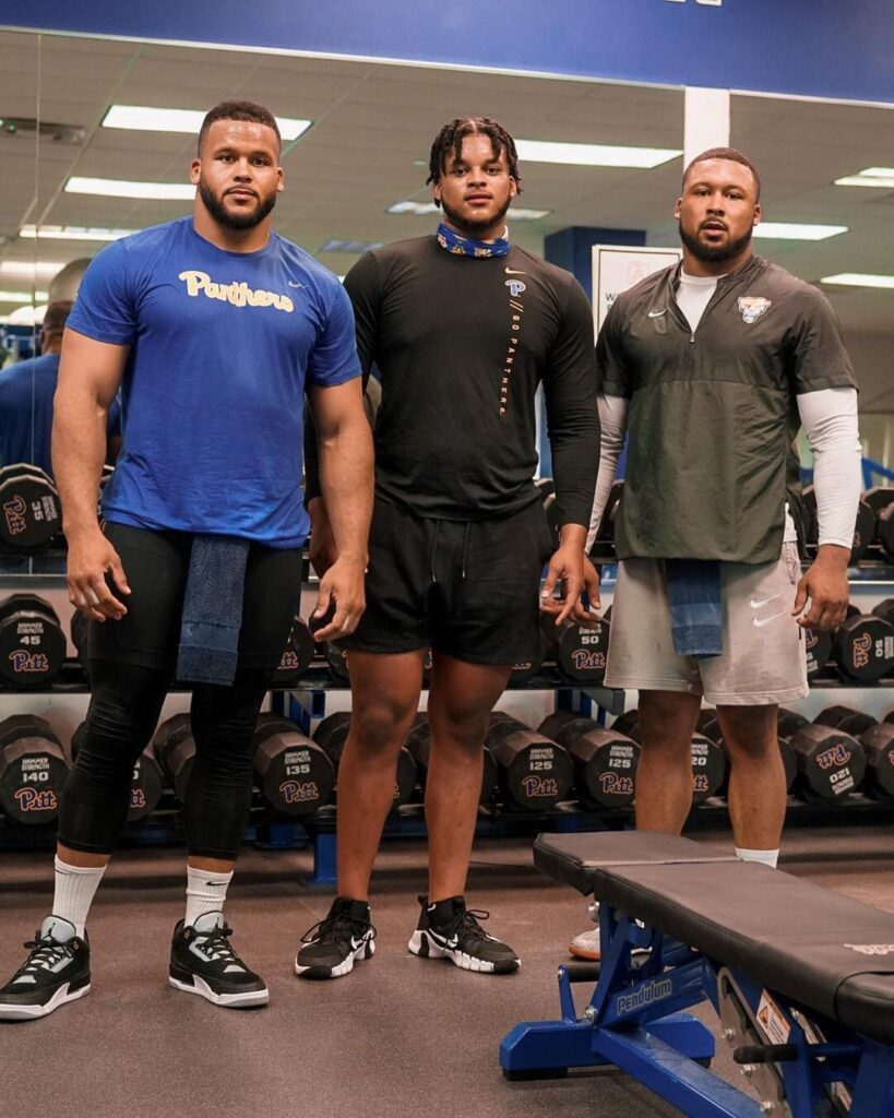 Aaron and Archie III in gym wear